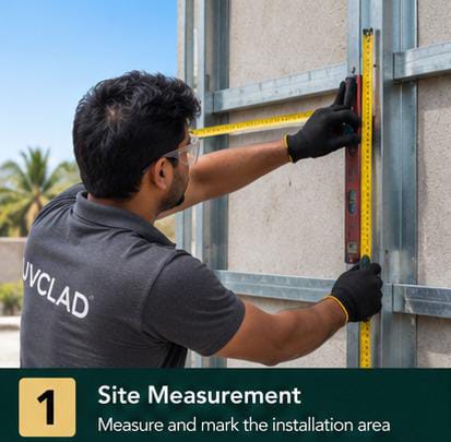 Installer measuring the wall elevation with a tape measure before HPL installation