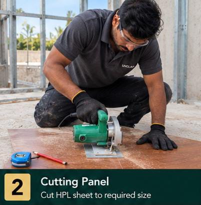 Installer cutting an HPL sheet to size with a circular cutter